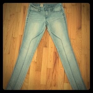 Volcom light wash Moto denim jeans.